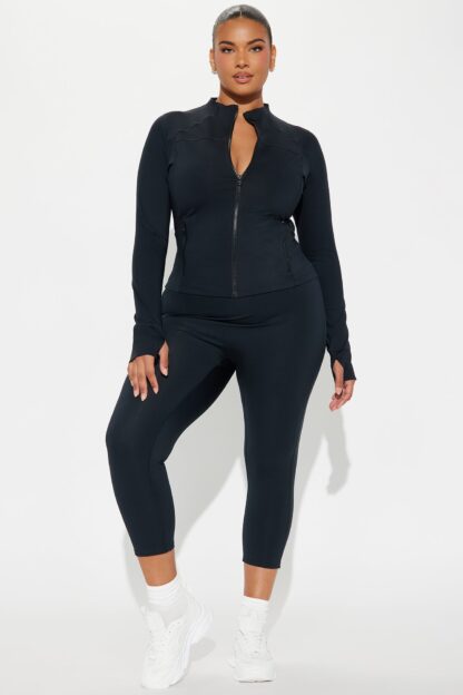 Chaqueta Deportiva Negra Elevate con Cuello Alto - Image 6