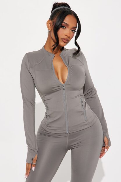 Chaqueta Deportiva Negra Elevate con Cuello Alto - Image 10