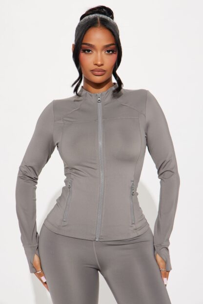Chaqueta Deportiva Negra Elevate con Cuello Alto - Image 12